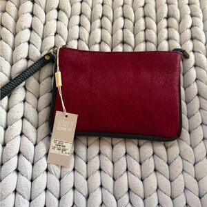 Red leather clutch